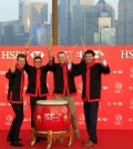 From left to right, Tennis players Henrik Stenson, Rickie Fowler, Jordan Spieth, Bubba Watson, hold drum sticks for photo during the HSBC Champions golf tournament photocall in Shanghai, China Thursday Nov.3, 2015. (AP Photo)