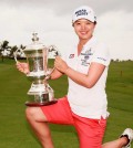 Kim Sei-young of South Korea holds her trophy after winning the Blue Bay LPGA in Hainan Island, China on Nov. 1, 2015. (AP Photo/Adam Hunger)
