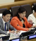 North Korean defectors Joseph Kim, left, Jay Jo, center, and Kim Hye-Sook participate in a panel on North Korean human rights abuses at United Nations headquarters, Thursday, April 30, 2015. (AP Photo/Seth Wenig)