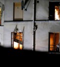 In this Wednesday, Nov. 18, 2015 file photo, bullet holes are pictured around a window on the back side of the house after an intervention of security forces against a group of extremists in Saint-Denis, near Paris. A woman wearing an explosive suicide vest blew herself up Wednesday as heavily armed police tried to storm a suburban Paris apartment where the suspected mastermind of last week's attacks was believed to be holed up, police said. While most suicide bombers are men, Islamic militant groups have occasionally deployed women to carry out such attacks. Long before the rise of Islamic radicalism, women suicide bombers were used by leftist and separatist groups in the Arab and beyond. (AP Photo/Michel Euler)