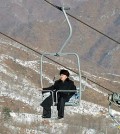 This 2013 file photo shows Kim Jong-un on ski lift at Masikryong Ski Resort in Kangwon Province. (Yonhap)
