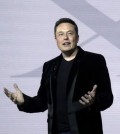 Elon Musk, CEO of Tesla Motors Inc. and another executive spoke in South Korea about expanding business. (AP Photo/Marcio Jose Sanchez)