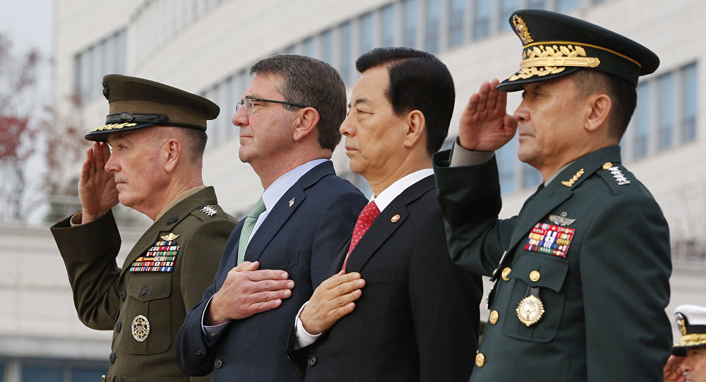 From left, U.S. Chairman of the Joint Chiefs of Staff Gen. Joseph Dunford, U.S. Defense Secretary Ash Carter, South Korean Defense Minister Han Min Koo and South Korean Chairman of Joint Chiefs of Staff Gen. Lee Sun-jin salute during a welcome ceremony at the Defense Ministry in Seoul, South Korea, Monday, Nov. 2, 2015. Carter called on North Korea to shrink and eventually eliminate its nuclear weapons program, while acknowledging during a visit Sunday to the Demilitarized Zone dividing the two Koreas that prospects for reconciling with the defiant North are dim. Ash Carter will attends at the 47th Security Consultative Meeting or SCM. (AP Photo/Lee Jin-man)