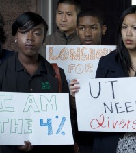 Supporters of the University of Texas in its case against Abigail Fisher demonstrate at the Homer Thornberry Judicial Building in Austin, Texas. The 5th Circuit Court of Appeals is rehearing the case of Abigail Fisher, a white woman who in 2008 was not admitted to the University of Texas at Austin because she did not graduate in the top 10 percent of her high school class _ the criterion for 75 percent of the school's admissions. (AP Photo/Austin American-Statesman, Jay Janner)