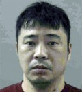 his undated law enforcement booking photo provided by the Weber County, Utah, Sheriff's Offiice shows Song Il Kim. Kim,42, from North Korea, accused of trying to buy military-grade night vision goggles from a Utah-based undercover agent and illegally export them to China, has pleaded guilty to a federal charge in an agreement with prosecutors at a hearing in Salt Lake City Wednesday, Dec. 9, 2015.(Weber County Sheriff's Office via AP)