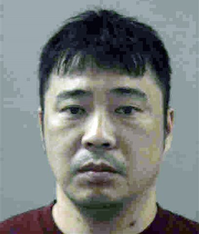 his undated law enforcement booking photo provided by the Weber County, Utah, Sheriff's Offiice shows Song Il Kim. Kim,42, from North Korea, accused of trying to buy military-grade night vision goggles from a Utah-based undercover agent and illegally export them to China, has pleaded guilty to a federal charge in an agreement with prosecutors at a hearing in Salt Lake City Wednesday, Dec. 9, 2015.(Weber County Sheriff's Office via AP)