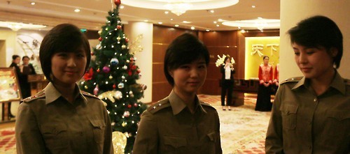 Members of Moranbong Band, North Korea's all-female troupe, arrive at a hotel in Beijing on Dec. 10, 2015, for what will be their first performance in a foreign country. (Yonhap)