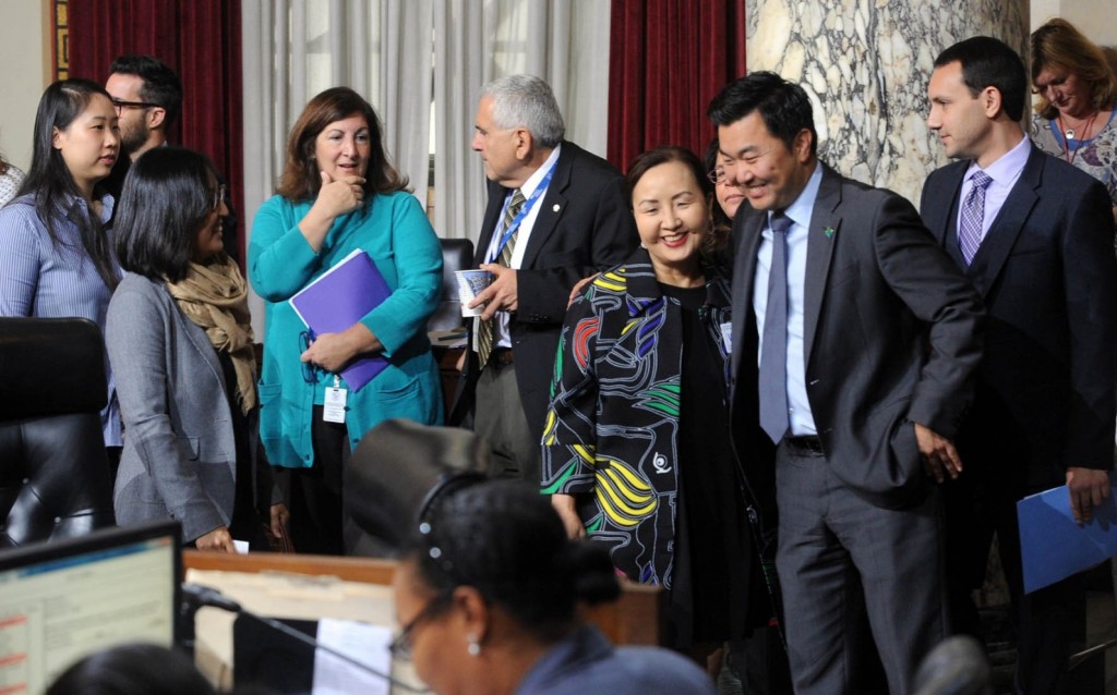Kay Song, of the Korean American National Museum board of directors, third from left, celebrates the passing of the museum proposal by Los Angeles City Council with District 4 representative David Ryu. (Park Sang-hyuk/Korea Times)