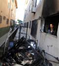 A representative from the  management company of the apartment inspects the premises after the fire was extinguished. (Korea Times photo by Park Sang-hyuk)