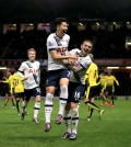 Tottenham Hotspur's Son Heung-Min, centre left, celebrates scoring his side's second goal of the game with teammate Kieran Trippier, during the English Premier League match between Watford and Tottenham Hotspur, at Vicarage Road, in Watford, England, Monday Dec. 28, 2015. (Nick Potts/PA via AP)