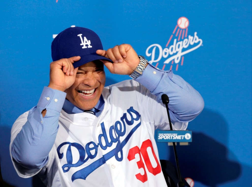 Los Angeles Dodgers Dave Roberts is officially introduced as the first minority manager in franchise history at Dodger Stadium in Los Angeles Tuesday, Dec. 1, 2015. (AP Photo/NIck Ut)