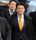 Tatsuya Kato, a Japanese journalist accused of defamation against the South Korean president, walks into the Seoul Central District Court on Dec. 17, 2015, for his sentencing trial. (Yonhap)