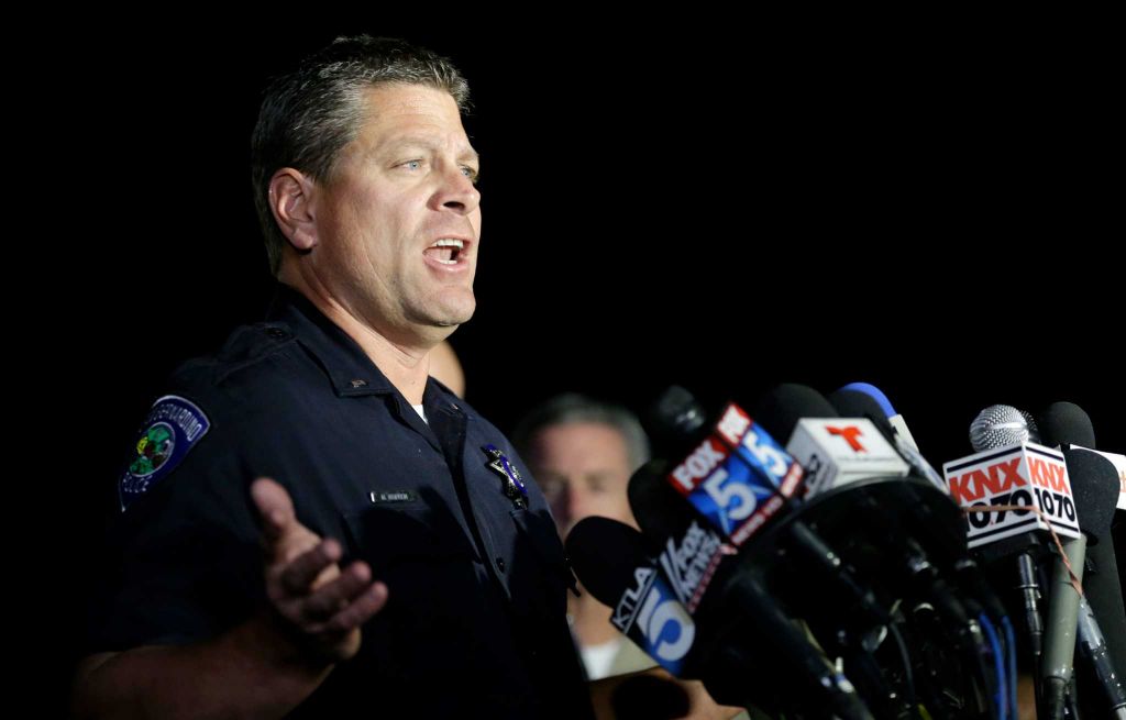 San Bernardino Police Lt. Mike Madden who was one one of the first officers on scene describes his experience during a press conference near the site of yesterday's mass shooting on Thursday, Dec. 3, 2015 in San Bernardino, Calif. A husband and wife on Wednesday, dressed for battle and carrying assault rifles and handguns, opened fire on a holiday banquet for his co-workers, killing at least 14 people and seriously wounding more than a dozen others in a precision assault, authorities said. Hours later, the couple died in a shootout with police. (AP Photo/Chris Carlson)