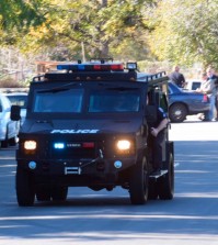 A swat team arrives at the scene of a shooting in San Bernardino, Calif., on Wednesday,  Dec. 2, 2015.  Police responded to reports of an active shooter at a social services facility. (Doug Saunders/Los Angeles News Group via AP)