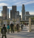 Los Angeles-area students head back to school at the Edward R. Roybal Learning Center in Los Angeles Wednesday, Dec. 16, 2015. Students are heading back to class a day after an emailed threat triggered a shutdown of the vast Los Angeles Unified School District. (AP Photo/Damian Dovarganes)