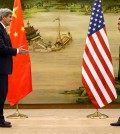 U.S. Secretary of State John Kerry, left, and Chinese Foreign Minister Wang Yi approach to shake hands after attending a news conference at the Ministry of Foreign Affairs in Beijing, Wednesday, Jan. 27, 2016. Kerry is on the final leg in his latest round-the-world diplomatic mission. (AP Photo/Jacquelyn Martin, Pool)