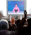 North Koreans watch a news broadcast on a video screen outside Pyongyang Railway Station in Pyongyang, North Korea, Wednesday, Jan. 6, 2016. Pyongyang has long claimed it has the right to develop nuclear weapons to defend itself against the U.S., an established nuclear power with whom it has been in a state of war for more than 65 years. But to build a credible nuclear threat, the North must explode new nuclear devices — including miniaturized ones — so its scientists can improve their designs and technology. (AP Photo/Kim Kwang Hyon)