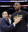 FILE - In this Nov. 2, 2015, file photo, Cleveland Cavaliers coach David Blatt pats LeBron James on the chest at the end of an NBA basketball game against the Philadelphia 76ers in Philadelphia. James’ calculating image wasn’t helped when the Cavaliers stunningly fired Blatt on Friday, Jan. 22, despite Blatt leading the team to the NBA Finals last season and an Eastern Conference-best 30-11 record this season. James has played for three coaches during his two stints in Cleveland, (AP Photo/Michael Perez, File)
