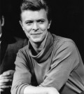 FILE - In this Sept. 17, 1980, file photo, David Bowie listens during a news conference after a rehearsal at the Booth Theater in New York.  Bowie was appearing in the Broadway production of "The Elephant Man." Bowie, the innovative and iconic singer whose illustrious career lasted five decades, died Monday, Jan. 11, 2015, after battling cancer for 18 months. He was 69. (AP Photo/Marty Lederhandler, FIle)