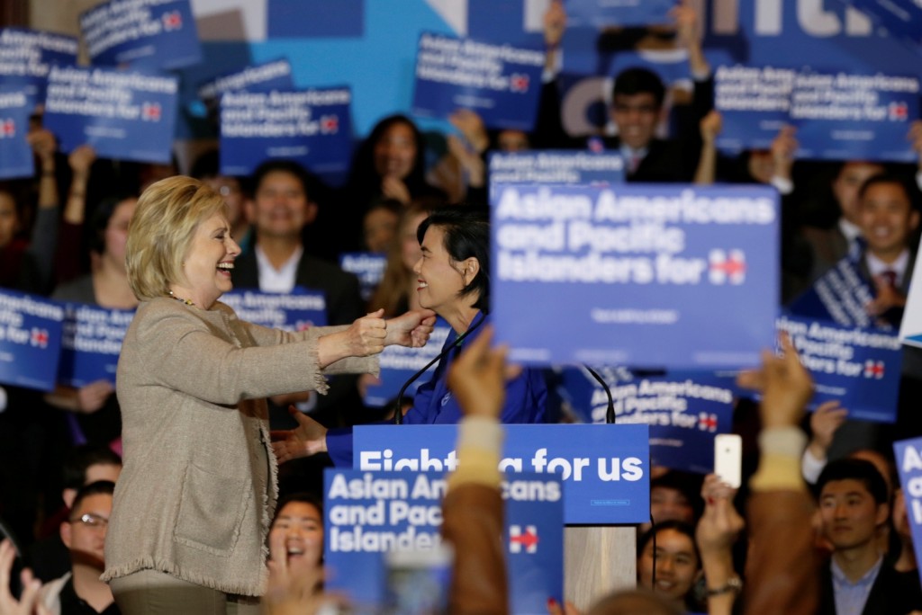 Democratic presidential candidate Hillary Clinton, left, is welcomed by Rep. Judy Chu, D-Calif., before addressing Asian American and Pacific Islander supporters in San Gabriel, Calif., Thursday, Jan. 7, 2016. (AP Photo/Damian Dovarganes)
