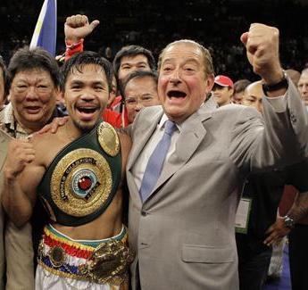 Before Bob Arum, right, began his boxing career in 1965, he was a lawyer in the U.S. Justice Department during the Kennedy and Johnson administrations. (AP / Jae C. Hong)
