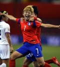 Jeon Ga-eul (7) led S. Korea to the round of 16 at the 2015 Women's World Cup. Jeon celebrates after scoring against Costa Rica on June 13, 2015. (Courtesy of KFA)