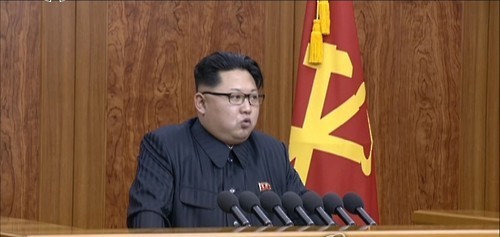 In this image captured from North Korea's Korean Central Television on Jan. 1, 2016, North Korean leader Kim Jong-un delivers a New Year's address live in Pyongyang. Kim called for improved relations with South Korea, saying that he is open to talks with Seoul in an open-minded manner for unification. (Yonhap)