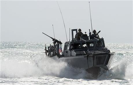 This Nov. 2, 2015, image provided by the U.S. Navy, shows Riverine Command Boat (RCB) 805 in the Persian Gulf. Iran was holding 10 U.S. Navy sailors and their two boats, similar to the one in this picture, on Jan. 12, 2016, after the boats had mechanical problems and drifted into Iranian waters. American officials have received assurances from Tehran that they will be returned safely and promptly. (Torrey W. Lee/U.S. Navy via AP)
