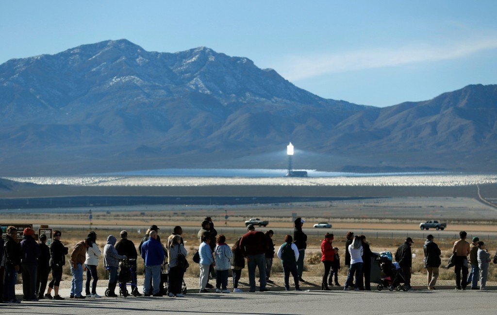 Patrons line up to buy Powerball lottery tickets outside the Primm Valley Casino Resorts Lotto Store just inside the California border Tuesday, Jan. 12, 2016, near Primm, Nev. The Powerball jackpot has grown to over $1 billion dollars for the next drawing on Wednesday. (AP Photo/John Locher)