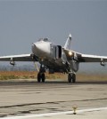 FILE - In this Oct. 22, 2015 file photo, a Russian Su-24 takes off on a combat mission at Hemeimeem airbase in Syria. Turkey said Saturday Jan. 30, 2016 that a Russian warplane SU-34 has again violated its airspace despite several warnings — two months after Turkey's military shot down a Russian jet for crossing over its territory. (AP Photo/Vladimir Isachenkov, File)