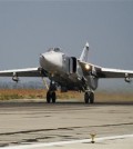 FILE - In this Oct. 22, 2015 file photo, a Russian Su-24 takes off on a combat mission at Hemeimeem airbase in Syria. Turkey said Saturday Jan. 30, 2016 that a Russian warplane SU-34 has again violated its airspace despite several warnings — two months after Turkey's military shot down a Russian jet for crossing over its territory. (AP Photo/Vladimir Isachenkov, File)