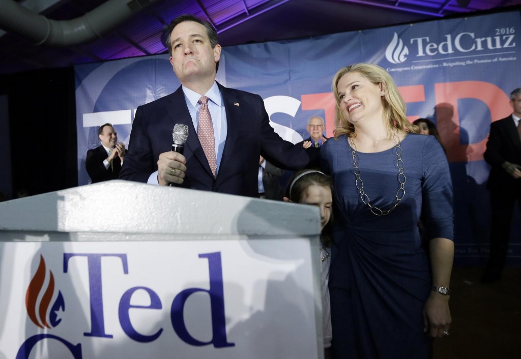 Republican presidential candidate, Sen. Ted Cruz, R-Texas, arrives for a caucus night rally with his wife Heidi, and daughter Caroline, 7, Monday, Feb. 1, 2016, in Des Moines, Iowa. (AP Photo/Charlie Neibergall)