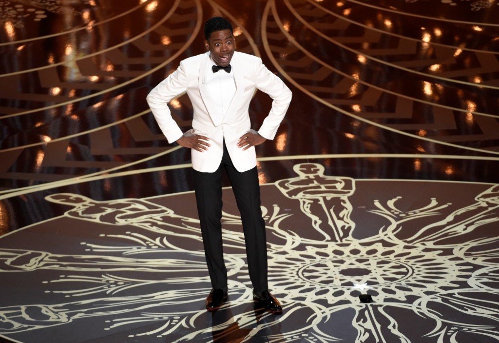 Host Chris Rock speaks at the Oscars on Sunday, Feb. 28, 2016, at the Dolby Theatre in Los Angeles. (Photo by Chris Pizzello/Invision/AP)