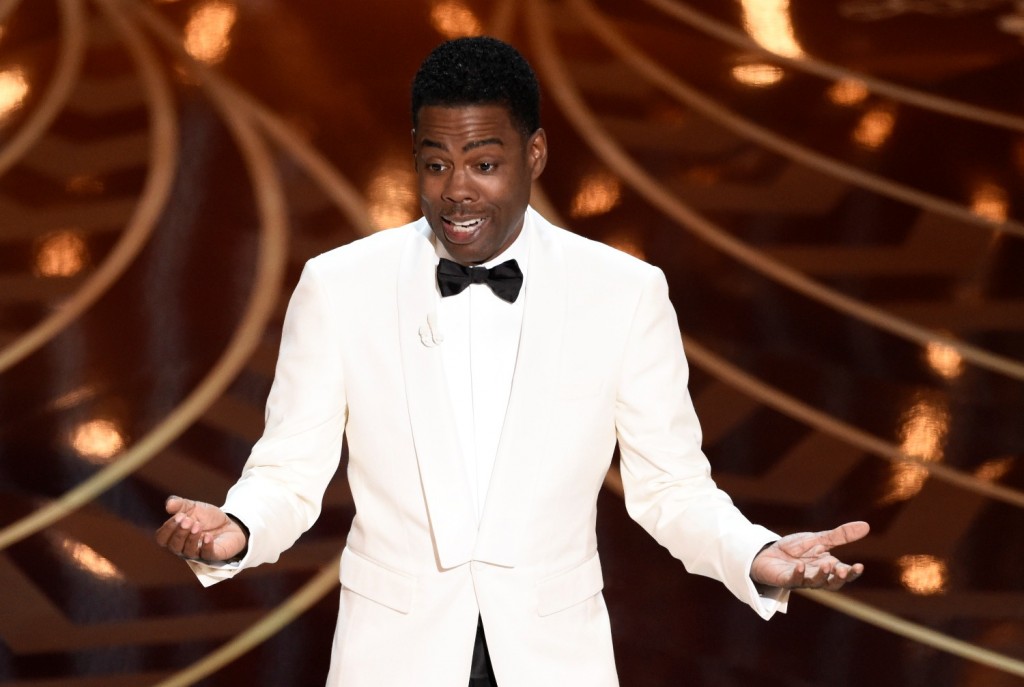 Host Chris Rock speaks at the Oscars on Sunday, Feb. 28, 2016, at the Dolby Theatre in Los Angeles. (Photo by Chris Pizzello/Invision/AP)