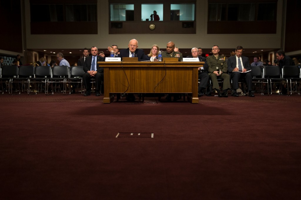 Director of National Intelligence James Clapper, left, accompanied by Defense Intelligence Agency Director Lt. Gen. Vincent Stewart, testifies on Capitol Hill in Washington, Tuesday, Feb. 9, 2016, before a Senate Armed Services Committee hearing on worldwide threats. (AP Photo/Evan Vucci)