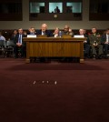 Director of National Intelligence James Clapper, left, accompanied by Defense Intelligence Agency Director Lt. Gen. Vincent Stewart, testifies on Capitol Hill in Washington, Tuesday, Feb. 9, 2016, before a Senate Armed Services Committee hearing on worldwide threats. (AP Photo/Evan Vucci)