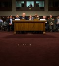 Director of National Intelligence James Clapper, left, accompanied by Defense Intelligence Agency Director Lt. Gen. Vincent Stewart, testifies on Capitol Hill in Washington, Tuesday, Feb. 9, 2016, before a Senate Armed Services Committee hearing on worldwide threats. (AP Photo/Evan Vucci)
