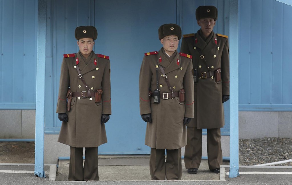 North Korean soldiers guard the truce village of Panmunjom at the Demilitarized Zone (DMZ) which separates the two Koreas on Monday, Feb. 22, 2016, in Panmunjom, North Korea. Though the world's most fortified border can often seem like a tourist trap, drawing throngs of camera-happy visitors on both sides every year, to the military-trained eye the Cold War style standoff along the DMZ is an incident waiting to happen. And with tensions between Seoul, Pyongyang and Washington, this is one of those times when that's more true than ever. (AP Photo/Wong Maye-E)