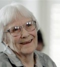 FILE - In this Aug. 20, 2007, file photo, author Harper Lee smiles during a ceremony honoring the four new members of the Alabama Academy of Honor at the Capitol in Montgomery, Ala. Harper Lee, the elusive author whose "To Kill a Mockingbird" became an enduring best seller and classic film with its child's-eye view of racial injustice in a small Southern town, has died according to Harper Collins spokeswoman Tina Andreadis. She was 89. (AP Photo/Rob Carr, File)