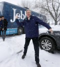 Republican presidential candidate, former Florida Gov. Jeb Bush throws a snowball following a campaign event, Monday, Feb. 8, 2016, in Nashua, N.H. (AP Photo/Steven Senne)