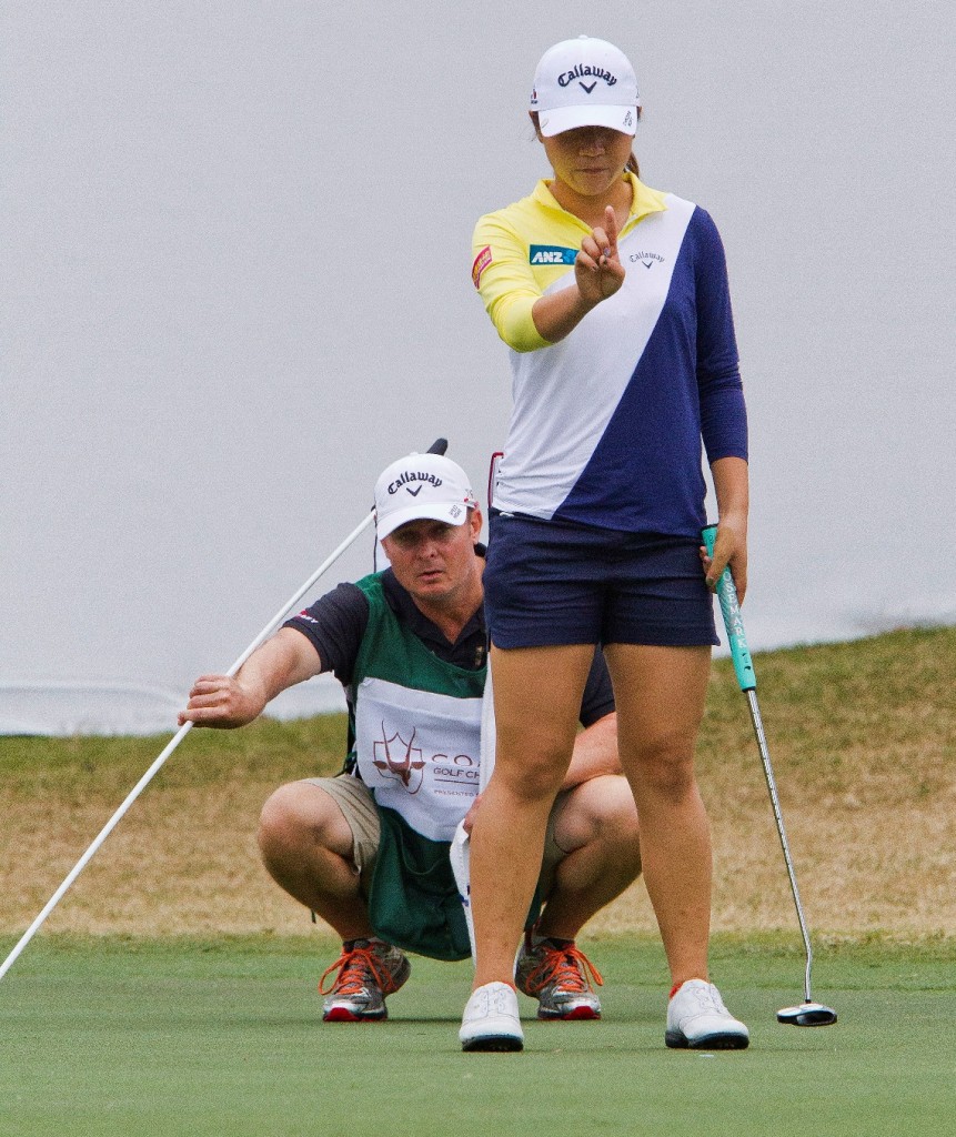 Lydia Ko lines up her putt on the 18th green during the second round of the Coates Golf Championship LPGA tournament at Golden Ocala on Thursday, Feb. 4, 2016, in Ocala, Fla. The second round was suspended because of thunderstorms in the area. (Doug Engle/The Star-Banner via AP)