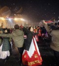 North Koreans dance on the Kim Il Sung Square to celebrate a satellite launch Monday, Feb. 8, 2016, in Pyongyang, North Korea. People in Pyongyang danced and watched fireworks the day after a rocket launch that has been strongly condemned by many countries around the world. (AP Photo/Jon Chol Jin)