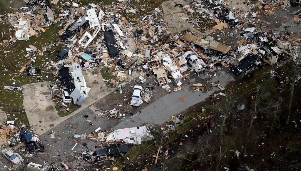 This aerial photo shows damage after a tornado ripped through the Sugar Hill Recreational Park in the town of Convent, in southern La., Wednesday, Feb. 24, 2016. Tornadoes ripped through the RV park in Louisiana and significantly damaged nearly 100 homes and apartments in Florida as a deadly storm system rolled across the South, and forecasters warned that more twisters were possible Wednesday along the East Coast. (David Grunfeld/NOLA.com The Times-Picayune via AP)