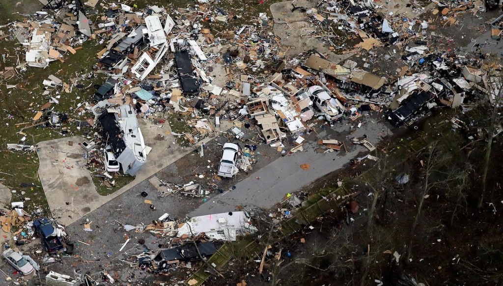 This aerial photo shows damage after a tornado ripped through the Sugar Hill Recreational Park in the town of Convent, in southern La., Wednesday, Feb. 24, 2016. Tornadoes ripped through the RV park in Louisiana and significantly damaged nearly 100 homes and apartments in Florida as a deadly storm system rolled across the South, and forecasters warned that more twisters were possible Wednesday along the East Coast. (David Grunfeld/NOLA.com The Times-Picayune via AP) 