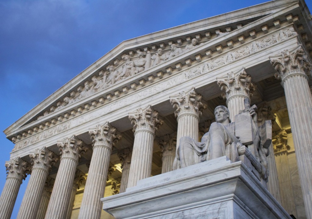 This Saturday, Feb. 13, 2016 photo shows the Supreme Court building at sunset in Washington.