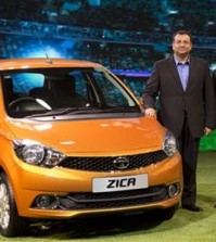 Tata Motors Chairman Cyrus Mistry, left, and Tim Leverton, head of Tata Engineering and Research and Development, pose for photographers during the unveiling of Zica at a press preview of Auto Expo in Greater Noida, near New Delhi, India, Wednesday, Feb. 3, 2016. The Zika virus has hit India's Tata Motors, which has decided to rebrand soon-to-be launched hatchback vehicle which was to have been called Zica, an abbreviation of "Zippy Car." Tata Motors said in a statement Tuesday that the car would carry the Zica nameplate during the exhibition, but a new name will be announced in a few weeks. (AP Photo/Manish Swarup)