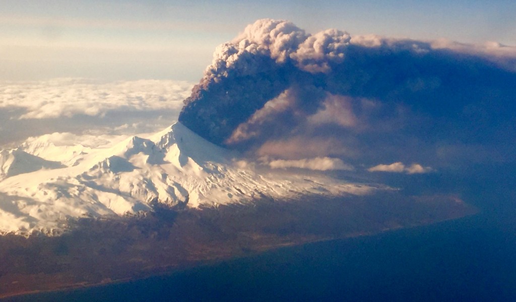 In this Sunday, March 27, 2016, photo, Pavlof Volcano, one of Alaska’s most active volcanoes, erupts, sending a plume of volcanic ash into the air. The Alaska Volcano Observatory says activity continued Monday. Pavlof Volcano is 625 miles southwest of Anchorage on the Alaska Peninsula, the finger of land that sticks out from mainland Alaska toward the Aleutian Islands. (Colt Snapp via AP)