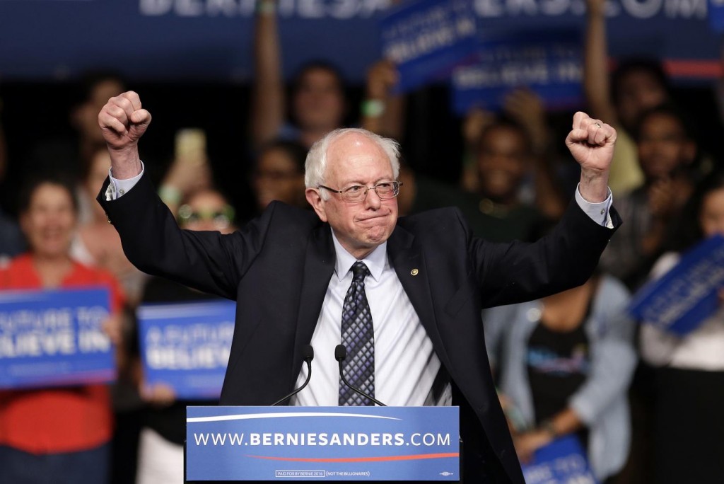 Democratic presidential candidate, Sen. Bernie Sanders, I-Vt. acknowledges his supporters on arrival at a campaign rally, Tuesday, March 8, 2016, in Miami. (AP Photo/Alan Diaz)