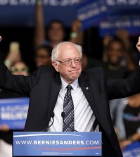 Democratic presidential candidate, Sen. Bernie Sanders, I-Vt. acknowledges his supporters on arrival at a campaign rally, Tuesday, March 8, 2016, in Miami. (AP Photo/Alan Diaz)