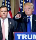 Republican presidential candidate Donald Trump, accompanied by New Jersey Gov. Chris Christie, left, takes questions from members of the media during a news conference on Super Tuesday primary election night in the White and Gold Ballroom at The Mar-A-Lago Club in Palm Beach, Fla., Tuesday, March 1, 2016. (AP Photo/Andrew Harnik)